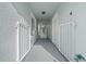 Covered walkway with white railings, leading to entry door at 17789 Se 113Th Ter, Summerfield, FL 34491