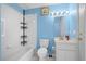 Clean bathroom with shower/tub combo and vanity at 17789 Se 113Th Ter, Summerfield, FL 34491