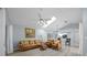 Relaxing living room with comfortable leather furniture and high ceilings at 17789 Se 113Th Ter, Summerfield, FL 34491