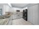 Kitchen boasts granite countertops and stainless steel appliances at 17789 Se 113Th Ter, Summerfield, FL 34491