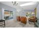 Open living space with access to a patio and backyard at 17789 Se 113Th Ter, Summerfield, FL 34491