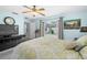 Main bedroom with sliding doors that lead to the backyard at 17789 Se 113Th Ter, Summerfield, FL 34491
