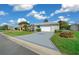 Single-story home with attached garage and landscaped yard at 17789 Se 113Th Ter, Summerfield, FL 34491
