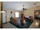 Living room with tile floors, couches and a coffee table at 727 Ne 130Th Ter, Silver Springs, FL 34488
