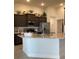 Modern kitchen with stainless steel appliances and island at 9115 Sw 49Th Ct, Ocala, FL 34476