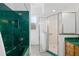 Bathroom with green marble bathtub and shower at 11700 Sw 72Nd Cir, Ocala, FL 34476