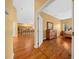 Hardwood floor bedroom with access to kitchen and main bathroom at 11700 Sw 72Nd Cir, Ocala, FL 34476