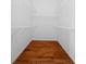 Walk-in closet with wire shelving and hardwood floor at 11700 Sw 72Nd Cir, Ocala, FL 34476