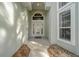 Front entry with glass door and sidelights leading into the home at 11700 Sw 72Nd Cir, Ocala, FL 34476