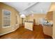 Kitchen with breakfast bar and view into living room at 11700 Sw 72Nd Cir, Ocala, FL 34476