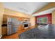 Spacious kitchen with stainless steel appliances and wood cabinets at 11700 Sw 72Nd Cir, Ocala, FL 34476