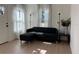 Living room with a sectional sofa and floor lamps at 5611 Berts Rd, Lady Lake, FL 32159