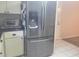 Stainless steel refrigerator in updated kitchen at 6484 Sw 111Th Pl, Ocala, FL 34476