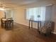 Dining area with wood-look flooring and built-in hutch at 6484 Sw 111Th Pl, Ocala, FL 34476