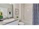 Clean bathroom with tub shower combo and granite countertop vanity at 8563 Pinecrest Trl, Wildwood, FL 34785