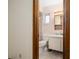 Clean bathroom with single sink vanity, toilet, and shower at 1335 Ne 33Rd St, Ocala, FL 34479