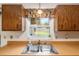 Kitchen sink with window overlooking backyard view at 1335 Ne 33Rd St, Ocala, FL 34479