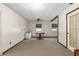 Spacious dining room with wood table and ceiling fan at 1335 Ne 33Rd St, Ocala, FL 34479