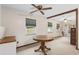 Dining room features a round table and ceiling fan at 1335 Ne 33Rd St, Ocala, FL 34479