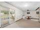 Bright bonus room with sliding door to screened porch at 1335 Ne 33Rd St, Ocala, FL 34479