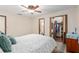 Main bedroom with ceiling fan, walk-in closet, and bathroom at 1335 Ne 33Rd St, Ocala, FL 34479