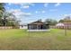 Backyard view with screened porch at 1335 Ne 33Rd St, Ocala, FL 34479