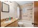 Updated bathroom with granite countertop vanity and tub at 1335 Ne 33Rd St, Ocala, FL 34479