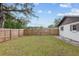 Backyard with wooden fence and gate at 1335 Ne 33Rd St, Ocala, FL 34479