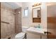 Bathroom with shower, grab bars, and updated vanity at 1335 Ne 33Rd St, Ocala, FL 34479