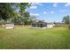 Spacious backyard with shed and screened porch at 1335 Ne 33Rd St, Ocala, FL 34479