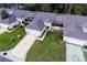 Aerial view of villa with driveway and landscaping at 15659 Sw 13Th Cir, Ocala, FL 34473