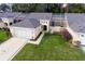 Aerial view of villa with driveway and landscaping at 15659 Sw 13Th Cir, Ocala, FL 34473