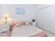 Bright bedroom with a double bed and large closet at 15659 Sw 13Th Cir, Ocala, FL 34473