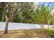 White vinyl privacy fence in the backyard at 15659 Sw 13Th Cir, Ocala, FL 34473
