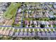 Wide aerial view of a residential neighborhood near a golf course at 15659 Sw 13Th Cir, Ocala, FL 34473