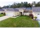 Aerial view of villa with driveway and landscaping at 15659 Sw 13Th Cir, Ocala, FL 34473