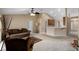 Open concept living room with kitchen and breakfast bar at 3107 Ne 24 Pl, Ocala, FL 34470
