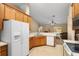 Open kitchen with views of living room and backyard at 3107 Ne 24 Pl, Ocala, FL 34470