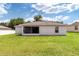 Large backyard with grassy area and privacy fence at 3107 Ne 24 Pl, Ocala, FL 34470