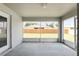 Spacious screened porch overlooking backyard at 3107 Ne 24 Pl, Ocala, FL 34470