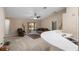 Living area with a sofa, armchair, and view to kitchen at 3107 Ne 24 Pl, Ocala, FL 34470