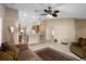 Open living room showcasing kitchen and access to backyard at 3107 Ne 24 Pl, Ocala, FL 34470
