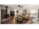 Living room with brick fireplace and comfortable seating at 5537 Sw 38 St, Ocala, FL 34474