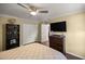 Bedroom with large closet and ceiling fan at 5537 Sw 38 St, Ocala, FL 34474