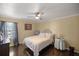Bright bedroom with hardwood floors and window at 5537 Sw 38 St, Ocala, FL 34474