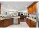 Open kitchen boasting stainless steel appliances and breakfast bar at 5537 Sw 38 St, Ocala, FL 34474