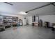 Garage with storage shelving and workbench at 5537 Sw 38 St, Ocala, FL 34474