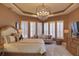 Luxurious main bedroom with ample natural light and sitting area at 7070 Se 14Th Ct, Ocala, FL 34480