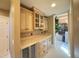 Butlers pantry with ample counter space and glass-front cabinets at 7070 Se 14Th Ct, Ocala, FL 34480