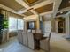 Elegant dining room featuring a large table and stunning chandelier at 7070 Se 14Th Ct, Ocala, FL 34480